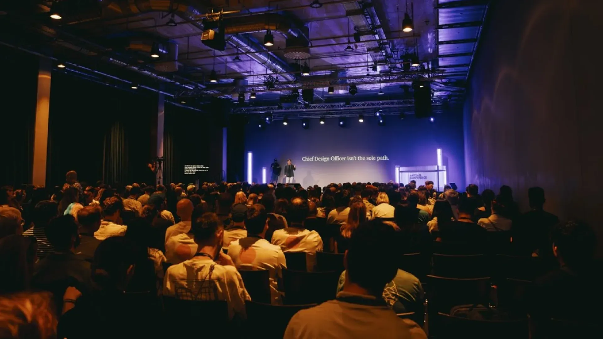 David Hoang speaking at Hatch Conference 2024, presenting on stage